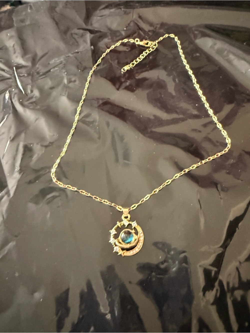 Gold-Tone Crescent Moon Pendant Necklace with Blue Stone